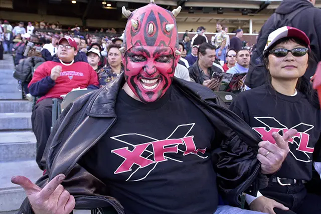 San Francisco Demons fan Mark Looney shows off his XFL shirt during the first quarter against the Los Angeles Xtreme, Sunday, Feb. 4, 2001 in San Francisco in their first XFL game.